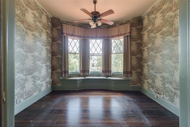 1415 N Hudson Ave, Oklahoma City, OK 73103 - empty room with hardwood / wood-style floors, baseboards, ceiling fan, wallpapered walls, and ornamental molding