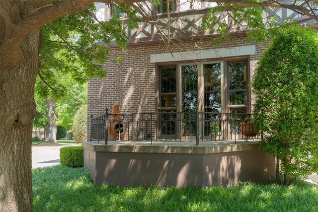 1415 N Hudson Ave, Oklahoma City, OK 73103 - view of home's exterior featuring brick siding