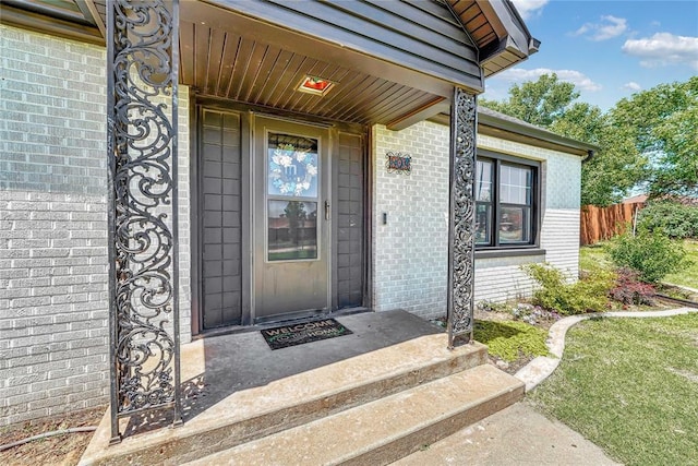 800 N Main St, Thomas, OK 73669 - entrance to property with brick siding and fence
