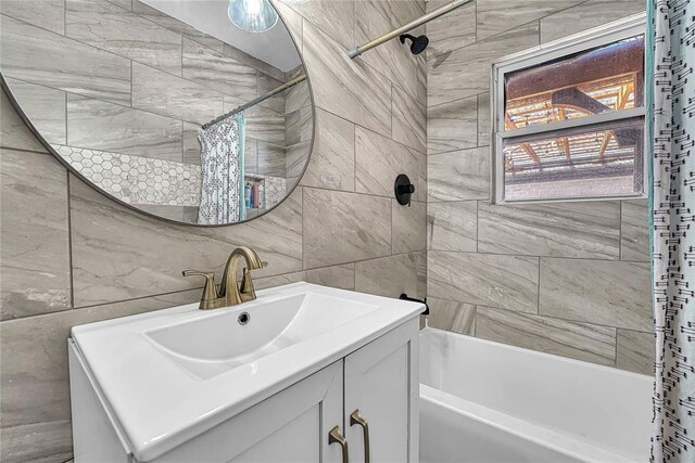 800 N Main St, Thomas, OK 73669 - full bathroom featuring tile walls, shower / tub combo, and vanity