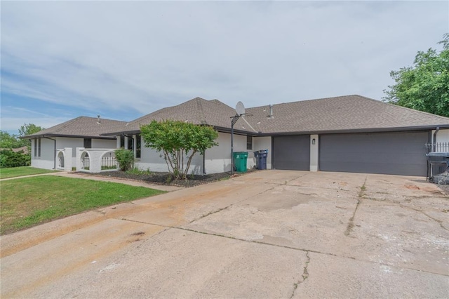 6212 N Utah Ave, Oklahoma City, OK 73112 - single story home with a garage, concrete driveway, and a front lawn