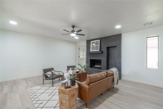 6212 N Utah Ave, Oklahoma City, OK 73112 - living room with light wood finished floors, a fireplace, baseboards, ceiling fan, and recessed lighting