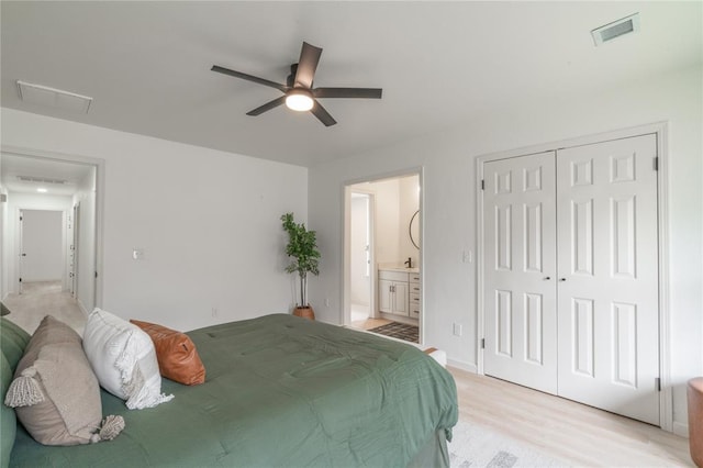 6212 N Utah Ave, Oklahoma City, OK 73112 - bedroom featuring connected bathroom, light wood-style floors, a closet, and ceiling fan
