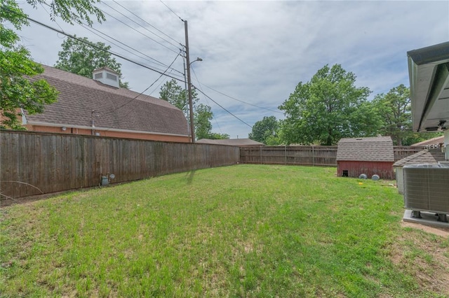 6212 N Utah Ave, Oklahoma City, OK 73112 - view of yard featuring a storage unit, central AC unit, and an outdoor structure