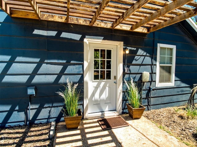 164 4th St, Faxon, OK 73540 - view of exterior entry with a pergola