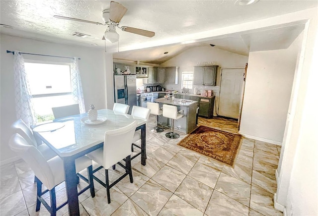 209 SW 40th St, Oklahoma City, OK 73109 - dining room featuring lofted ceiling and ceiling fan