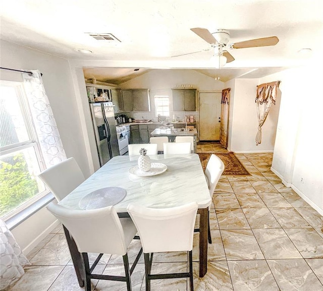 209 SW 40th St, Oklahoma City, OK 73109 - dining room with lofted ceiling and ceiling fan