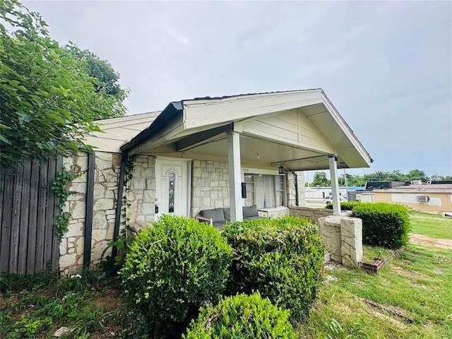 209 SW 40th St, Oklahoma City, OK 73109 - view of front of house with stone siding and covered porch