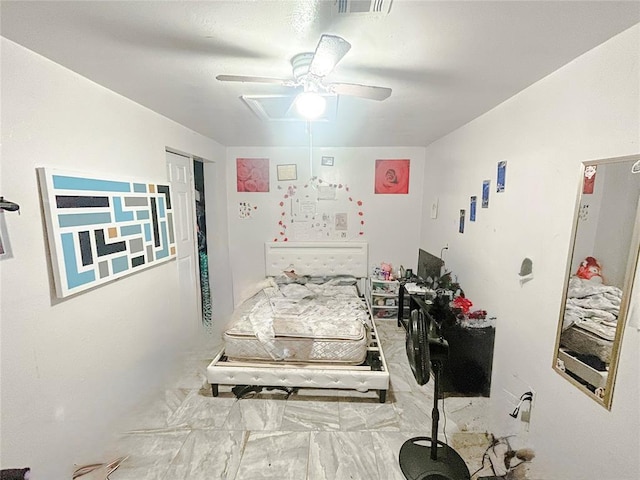 209 SW 40th St, Oklahoma City, OK 73109 - bedroom featuring marble look tile flooring and a ceiling fan