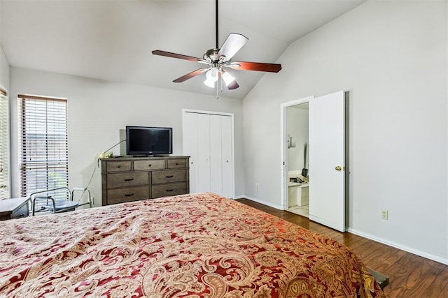 bedroom featuring vaulted ceiling, wood finished floors, baseboards, a closet, and a ceiling fan