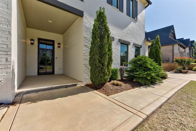 4209 Las Colinas Ln, Norman, OK 73072 - entrance to property with brick siding and a residential view