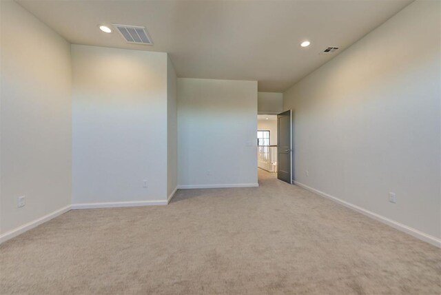 4209 Las Colinas Ln, Norman, OK 73072 - unfurnished room featuring light colored carpet, recessed lighting, and baseboards