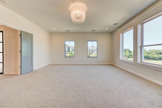 4209 Las Colinas Ln, Norman, OK 73072 - unfurnished room featuring a chandelier, light carpet, baseboards, and recessed lighting