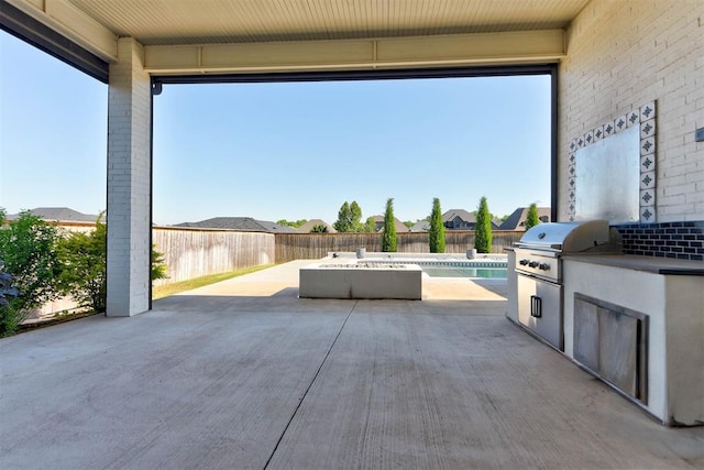 4209 Las Colinas Ln, Norman, OK 73072 - fenced backyard with a patio area