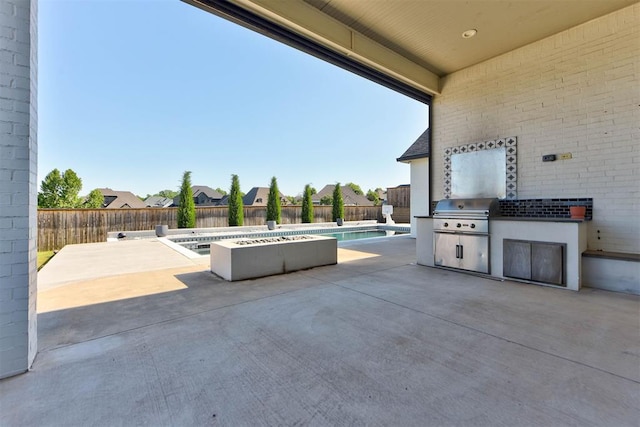 4209 Las Colinas Ln, Norman, OK 73072 - fenced backyard featuring a patio area and a residential view