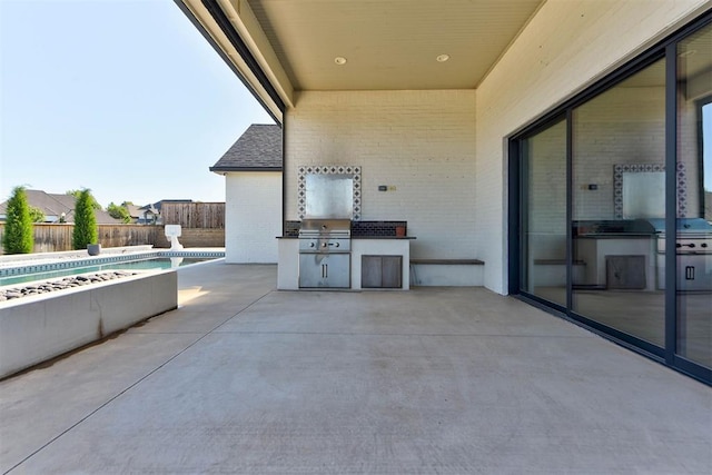 4209 Las Colinas Ln, Norman, OK 73072 - fenced backyard featuring a patio