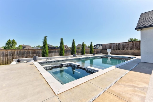 4209 Las Colinas Ln, Norman, OK 73072 - view of swimming pool with a fenced backyard, a pool with connected hot tub, and a patio