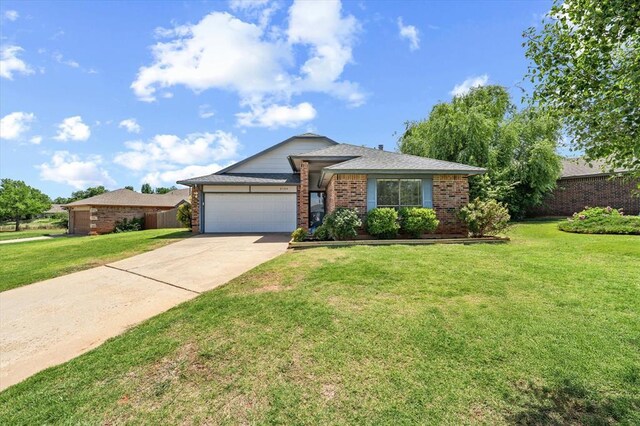 6104 Westlane, Oklahoma City, OK 73142 - ranch-style home with brick siding, an attached garage, and driveway