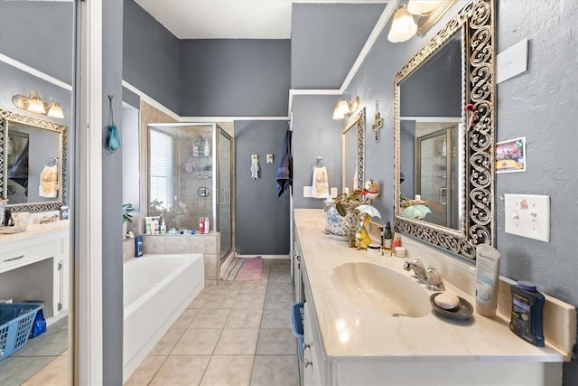 6104 Westlane, Oklahoma City, OK 73142 - bathroom featuring tile patterned flooring, a shower stall, a bath, and vanity