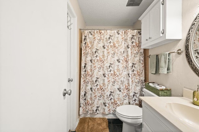 6104 Westlane, Oklahoma City, OK 73142 - full bathroom with a textured ceiling, tile patterned flooring, toilet, vanity, and curtained shower