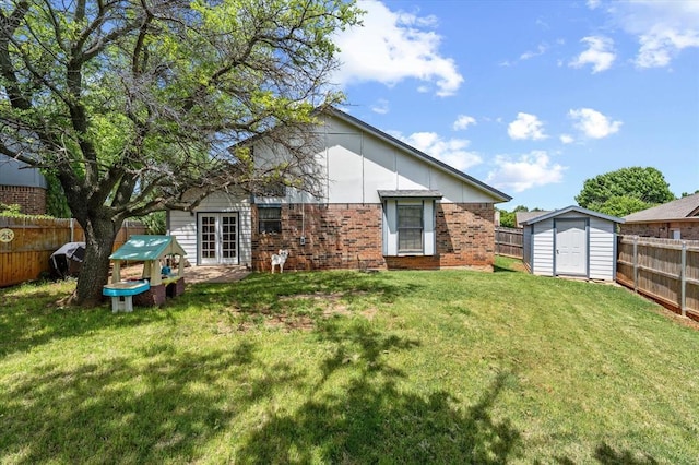 6104 Westlane, Oklahoma City, OK 73142 - back of house with brick siding, a shed, and an outdoor structure