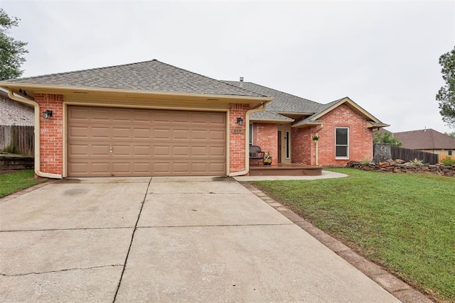 619 Rimrock Rd, Edmond, OK 73034 - ranch-style house featuring brick siding, a garage, driveway, and roof with shingles