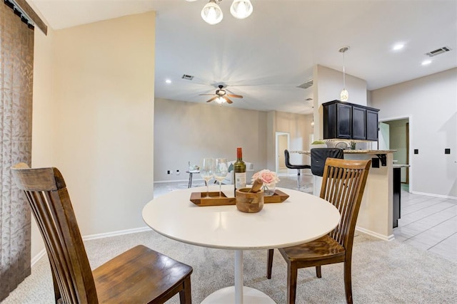 619 Rimrock Rd, Edmond, OK 73034 - dining room featuring light colored carpet, baseboards, ceiling fan, and recessed lighting