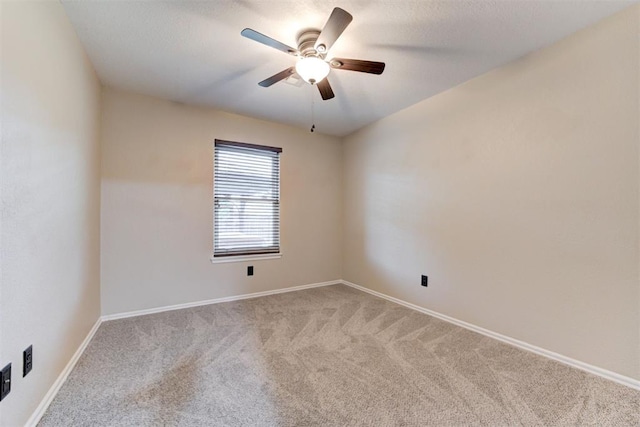 619 Rimrock Rd, Edmond, OK 73034 - empty room with carpet floors, ceiling fan, and baseboards