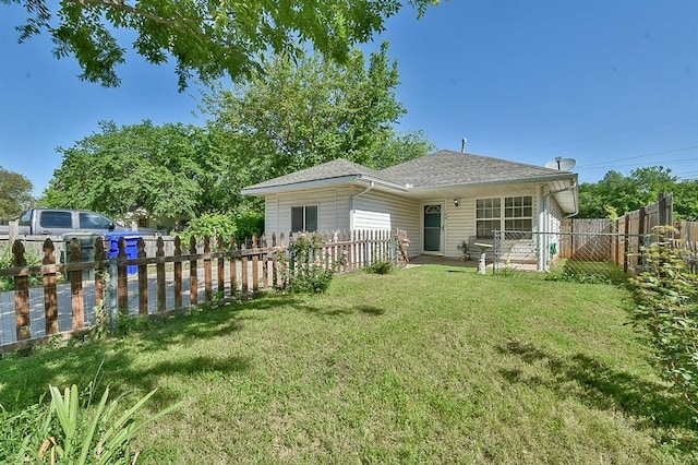 109 E Hayes St, Norman, OK 73069 - rear view of property with a shingled roof