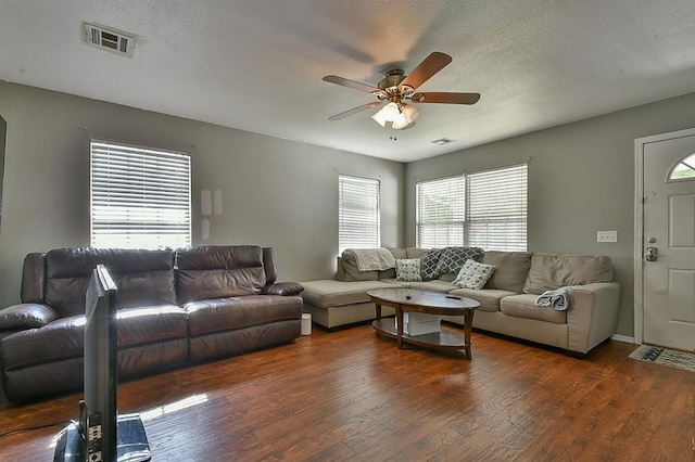 109 E Hayes St, Norman, OK 73069 - living area featuring ceiling fan, hardwood / wood-style flooring, and a textured ceiling