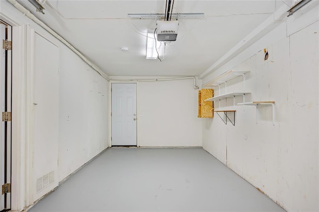 5016 NW 26th St, Oklahoma City, OK 73127 - garage featuring a garage door opener