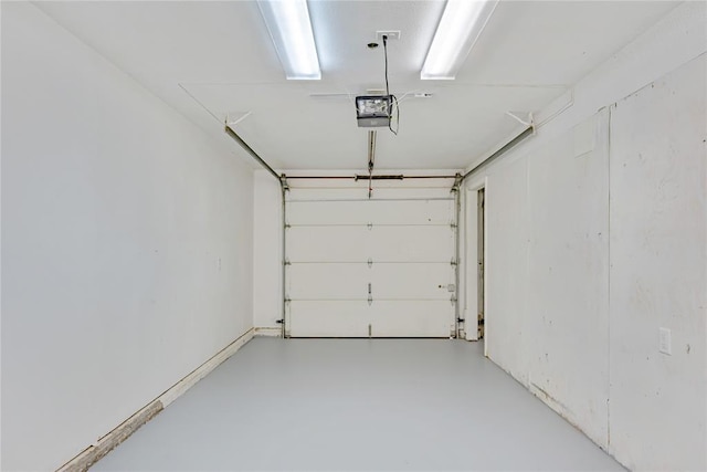 5016 NW 26th St, Oklahoma City, OK 73127 - garage featuring a garage door opener