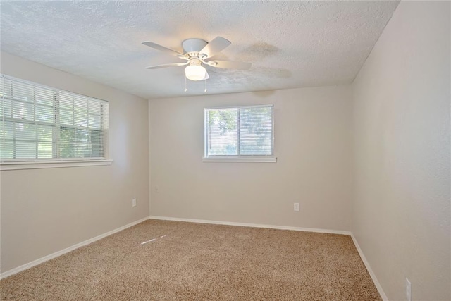 5016 NW 26th St, Oklahoma City, OK 73127 - spare room featuring a textured ceiling, ceiling fan, carpet, and baseboards