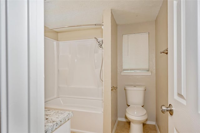 5016 NW 26th St, Oklahoma City, OK 73127 - bathroom with toilet, baseboards, shower / bath combination, and tile patterned flooring