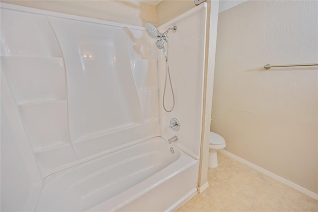 5016 NW 26th St, Oklahoma City, OK 73127 - bathroom featuring toilet, baseboards, tile patterned flooring, and tub / shower combination