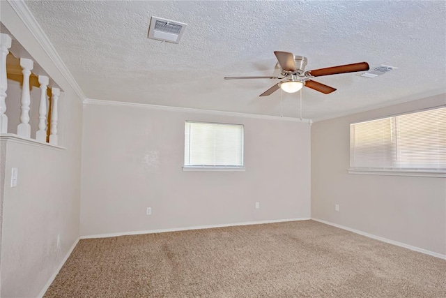 5016 NW 26th St, Oklahoma City, OK 73127 - carpeted spare room featuring a ceiling fan, crown molding, a textured ceiling, and baseboards