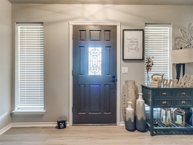 764 S Sara Rd, Tuttle, OK 73089 - entryway featuring wood finished floors, baseboards, and plenty of natural light
