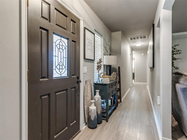 764 S Sara Rd, Tuttle, OK 73089 - foyer entrance featuring light wood-style flooring and baseboards