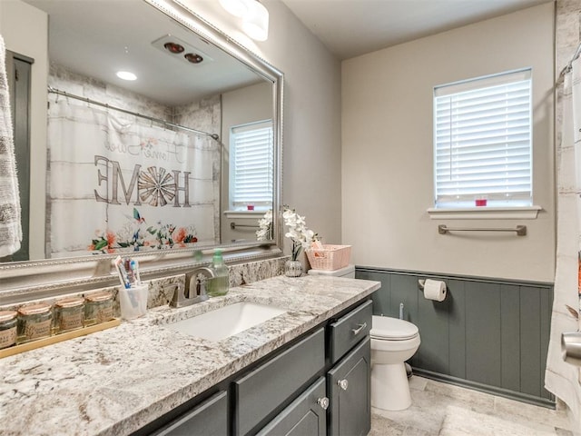 764 S Sara Rd, Tuttle, OK 73089 - bathroom featuring toilet, wainscoting, vanity, and a shower with shower curtain