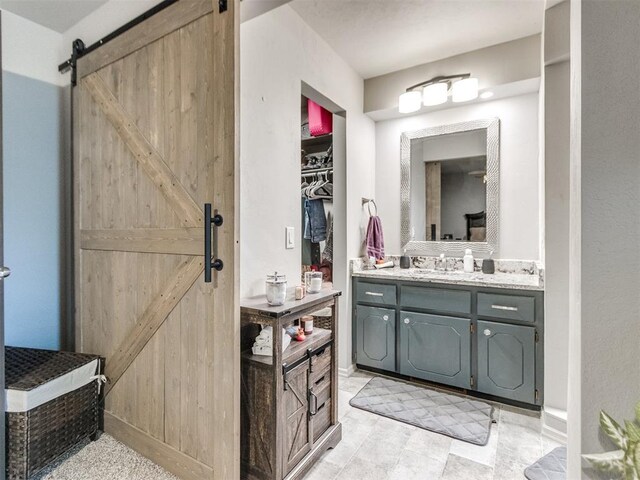 764 S Sara Rd, Tuttle, OK 73089 - bathroom with vanity and a spacious closet
