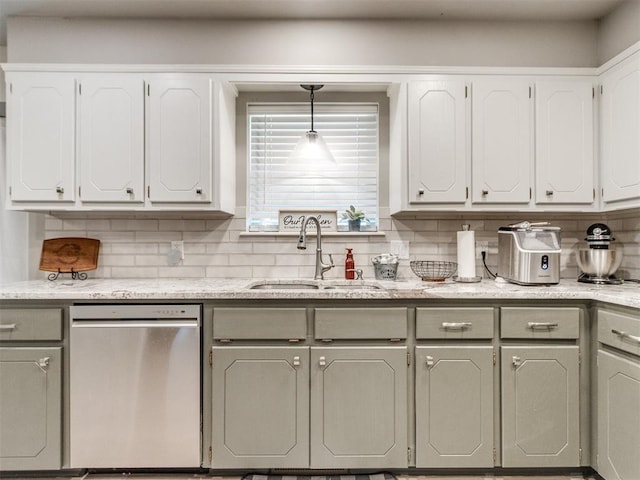 764 S Sara Rd, Tuttle, OK 73089 - kitchen featuring stainless steel dishwasher, a sink, white cabinets, and backsplash