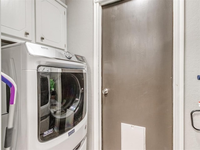 764 S Sara Rd, Tuttle, OK 73089 - clothes washing area with washer / dryer and cabinet space