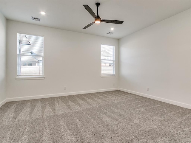 4405 Las Colinas Ln, Norman, OK 73072 - carpeted spare room with baseboards and a ceiling fan