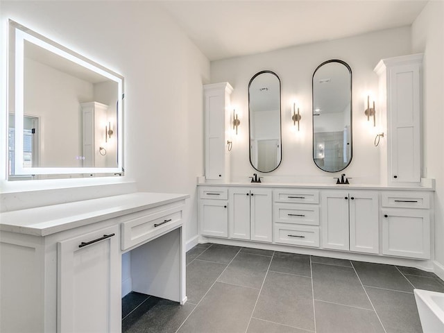 4405 Las Colinas Ln, Norman, OK 73072 - bathroom with double vanity, tile patterned flooring, and baseboards