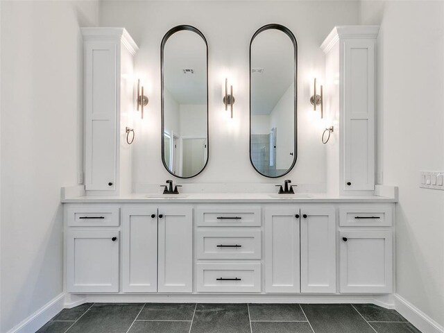 4405 Las Colinas Ln, Norman, OK 73072 - bathroom with baseboards, tile patterned flooring, and double vanity