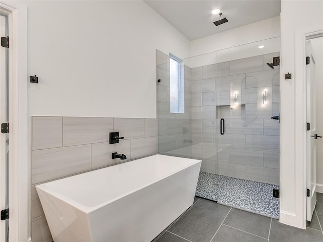 4405 Las Colinas Ln, Norman, OK 73072 - full bathroom featuring a shower stall, tile patterned floors, and a freestanding bath