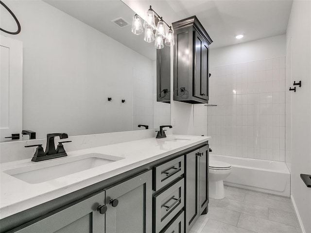 4405 Las Colinas Ln, Norman, OK 73072 - full bathroom with double vanity, toilet, recessed lighting, and tub / shower combination