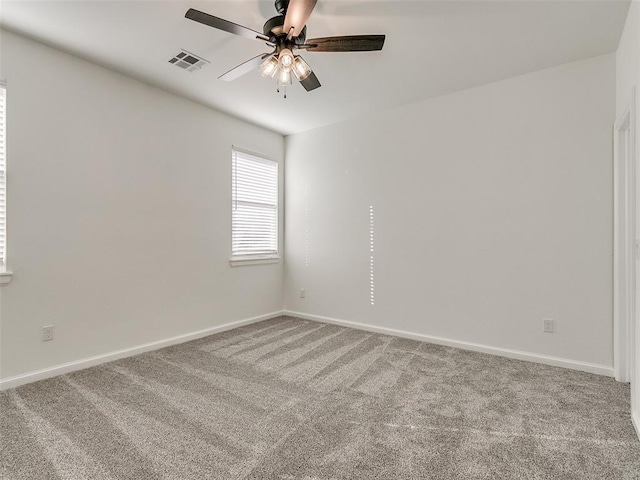 4405 Las Colinas Ln, Norman, OK 73072 - carpeted spare room featuring a ceiling fan and baseboards