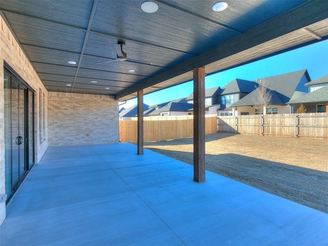 4405 Las Colinas Ln, Norman, OK 73072 - view of patio / terrace with a fenced backyard and a residential view