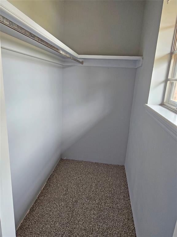 6805 Saint Marys Cir, Oklahoma City, OK 73132 - spacious closet featuring carpet floors